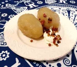 Lithuanian Cepelinai potato dumplings with pork meat